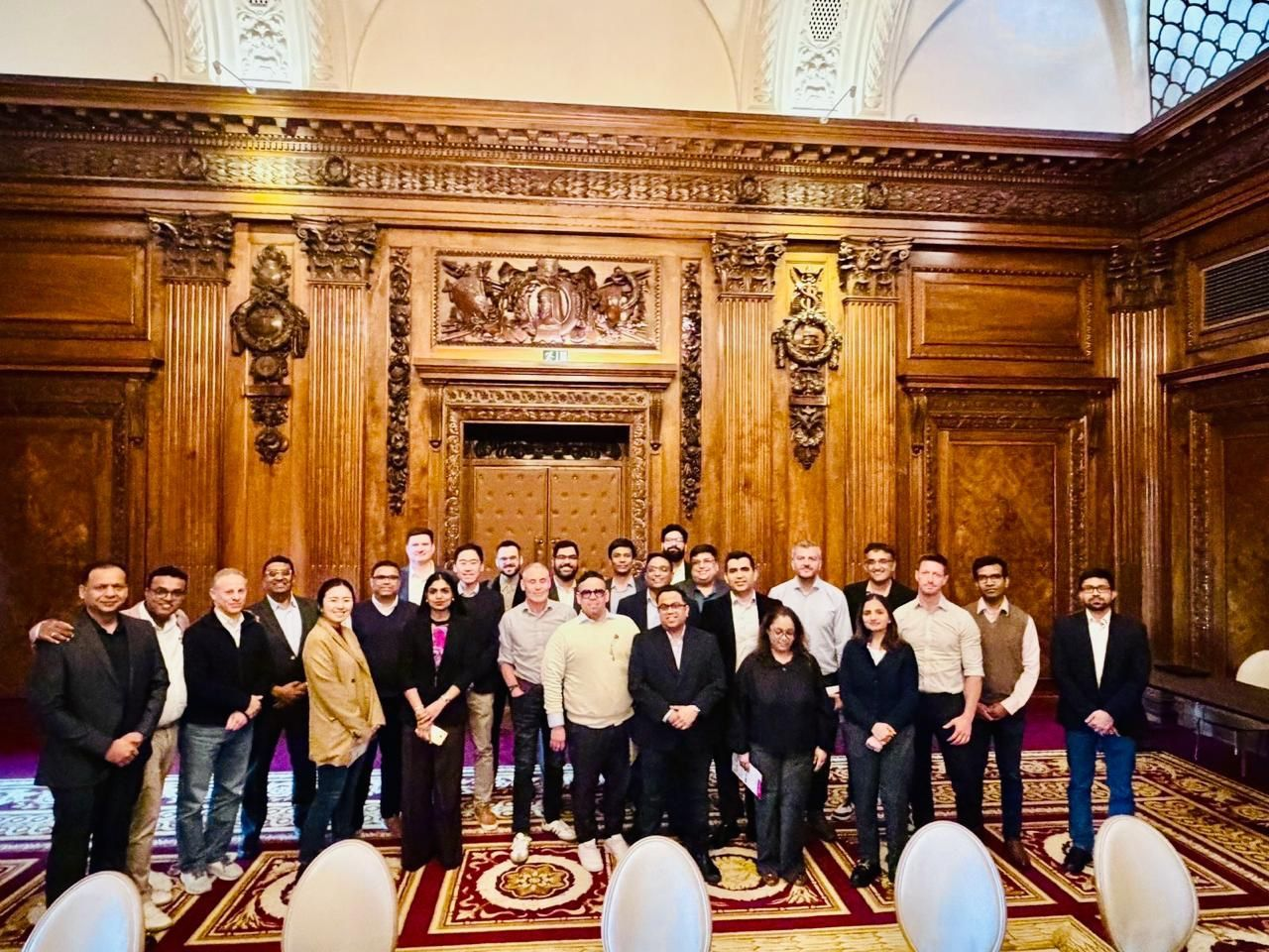 Eduardo and fellow roundtable participants in the UN Ballroom at Ten Trinity Square